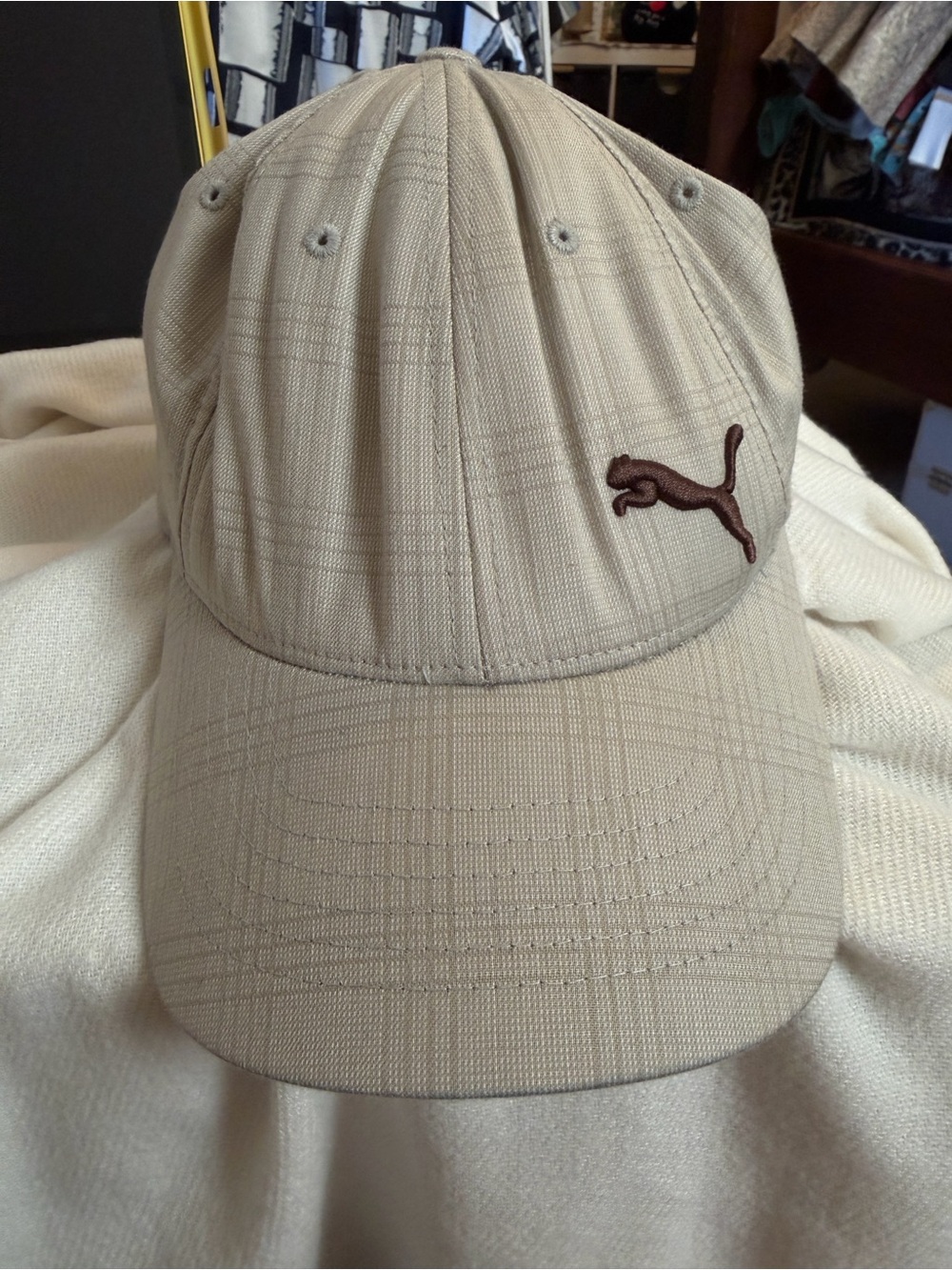 Puma flexfit baseball cap with an embroidered brown cat logo
